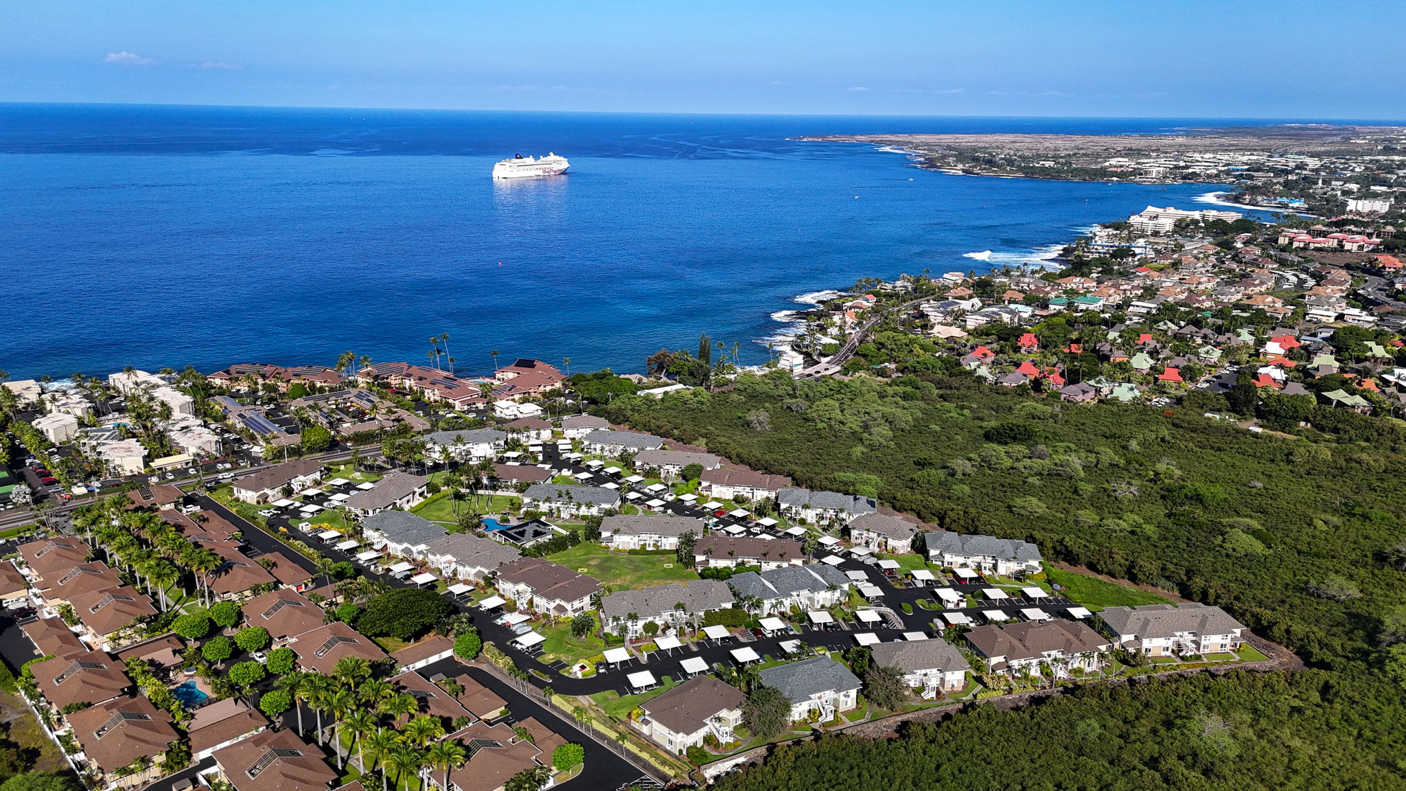 Aerial view of the Kona coastline, neighborhoods, and Pacific Ocean